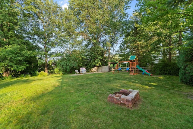 38 Heald St, Goffstown, NH 03102 - view of yard featuring a playground, an outdoor fire pit, and view of scattered trees
