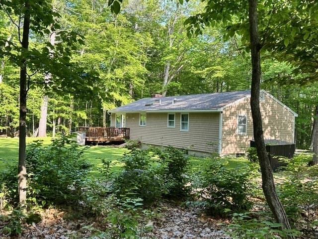 144 Windermere Rd, Moultonborough, NH 03254 - back of house featuring a deck and a wooded view