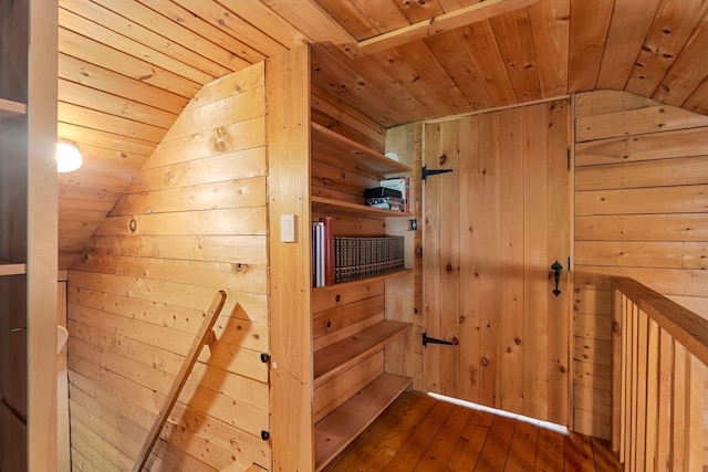 572 Old Cheshire Tpke, Charlestown, NH 03603 - hallway with lofted ceiling, wood ceiling, wood walls, and wood-type flooring