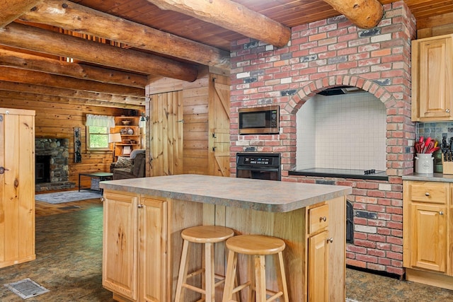 572 Old Cheshire Tpke, Charlestown, NH 03603 - kitchen featuring black oven, a wood ceiling with exposed beams, light brown cabinets, stainless steel microwave, and open floor plan