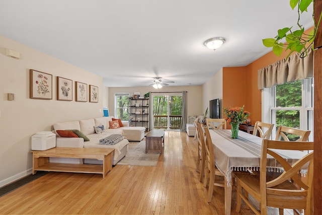 317 Old Concord Tpke Unit 1, Barrington, NH 03825 - living room featuring light wood-style floors and a ceiling fan