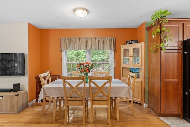 317 Old Concord Tpke Unit 1, Barrington, NH 03825 - dining area featuring light wood-type flooring