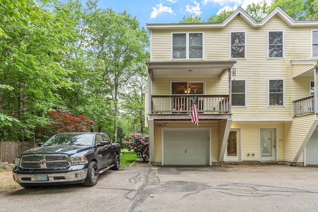 317 Old Concord Tpke Unit 1, Barrington, NH 03825 - view of front of home featuring an attached garage, a balcony, and driveway