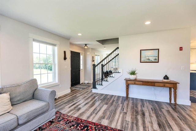 39 Windy Fields Ln, Jaffrey, NH 03452 - living room with wood finished floors, stairway, and recessed lighting
