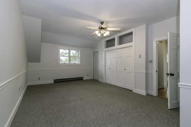 153 N Rd, Brentwood, NH 03833 - unfurnished bedroom with baseboard heating, carpet floors, lofted ceiling, ceiling fan, and multiple closets