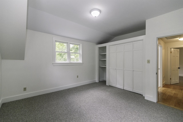 153 N Rd, Brentwood, NH 03833 - unfurnished bedroom featuring lofted ceiling, carpet, and a closet