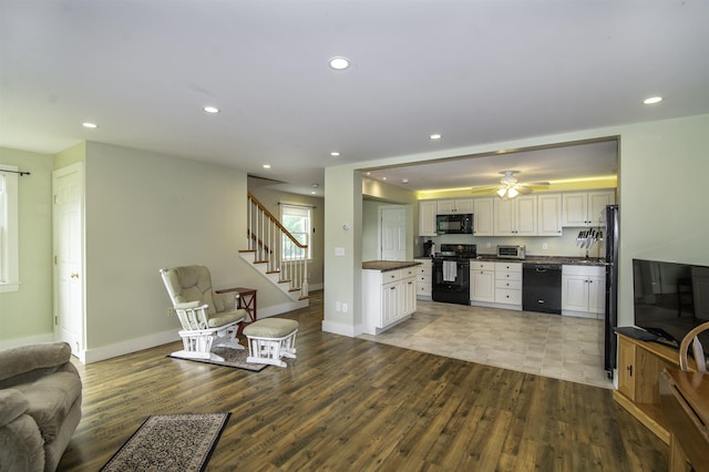 153 N Rd, Brentwood, NH 03833 - living area featuring wood finished floors, recessed lighting, stairs, and ceiling fan