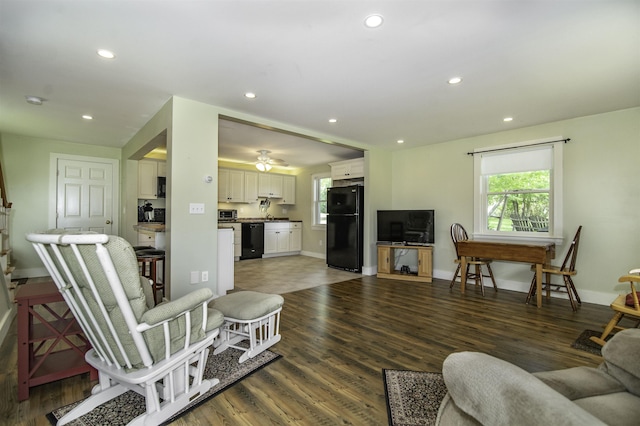 153 N Rd, Brentwood, NH 03833 - living area with plenty of natural light, wood finished floors, recessed lighting, and a ceiling fan