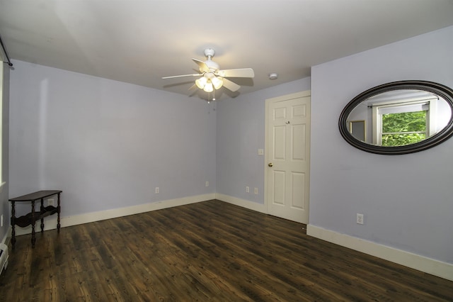 153 N Rd, Brentwood, NH 03833 - unfurnished room featuring ceiling fan, dark wood-type flooring, a baseboard heating unit, and a smoke detector