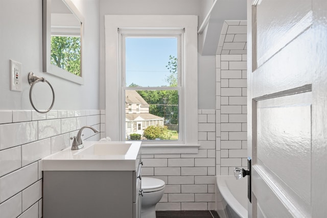 24B Grand Ave, Nashua, NH 03060 - full bathroom featuring tile walls and vanity