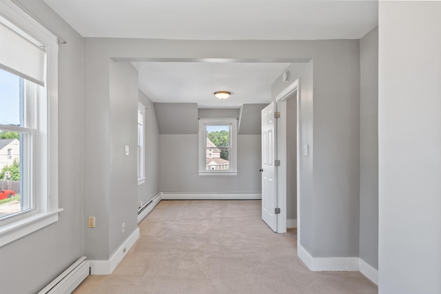 24B Grand Ave, Nashua, NH 03060 - corridor with a baseboard heating unit and light carpet