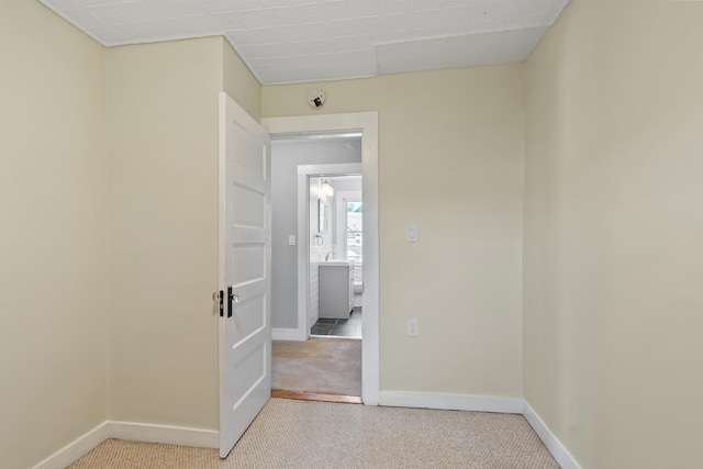 24B Grand Ave, Nashua, NH 03060 - carpeted empty room featuring baseboards