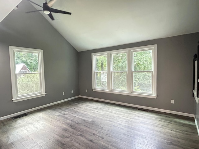 32 Muddy Pond Rd, Kensington, NH 03833 - empty room with healthy amount of natural light, ceiling fan, lofted ceiling, and dark wood-type flooring