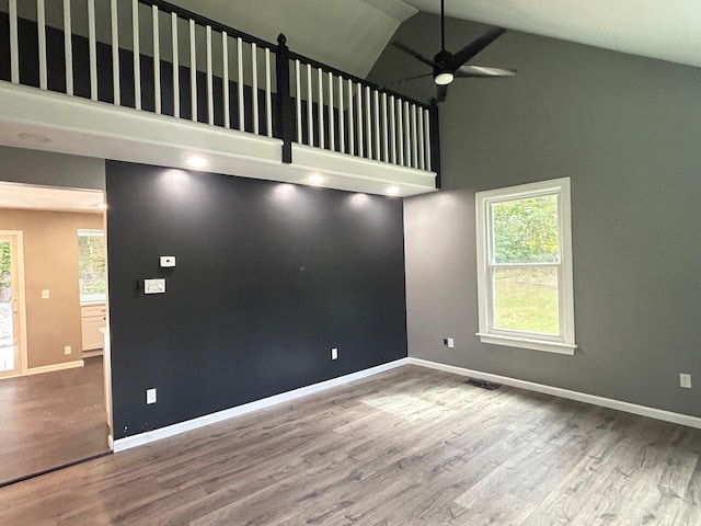 32 Muddy Pond Rd, Kensington, NH 03833 - empty room with ceiling fan, high vaulted ceiling, and wood finished floors