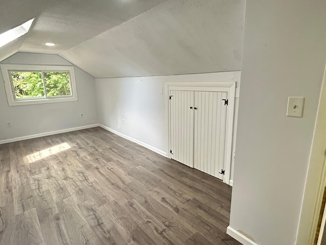 32 Muddy Pond Rd, Kensington, NH 03833 - bonus room featuring lofted ceiling and wood finished floors