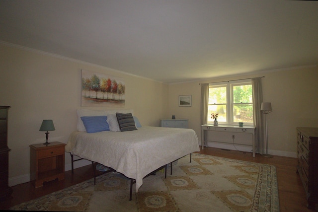 7 Minuteman Ln Unit 7, Exeter, NH 03833 - bedroom featuring wood finished floors and crown molding