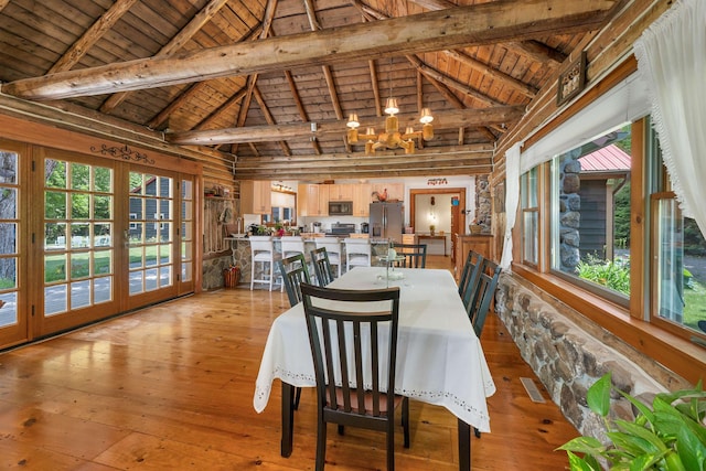 83 Towle Rd, Jackson, NH 03846 - dining area with a wood ceiling with exposed beams, healthy amount of natural light, light wood finished floors, a chandelier, and high vaulted ceiling