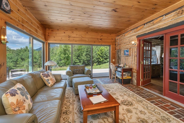 83 Towle Rd, Jackson, NH 03846 - living room with brick floors, wooden ceiling, healthy amount of natural light, and wooden walls