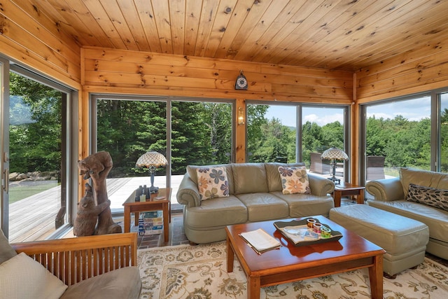 83 Towle Rd, Jackson, NH 03846 - living area with wood ceiling, wood walls, and healthy amount of natural light