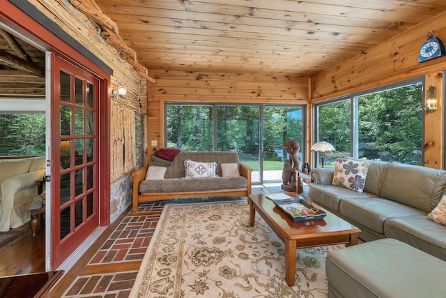 83 Towle Rd, Jackson, NH 03846 - living area featuring wooden ceiling, brick flooring, plenty of natural light, and wood walls