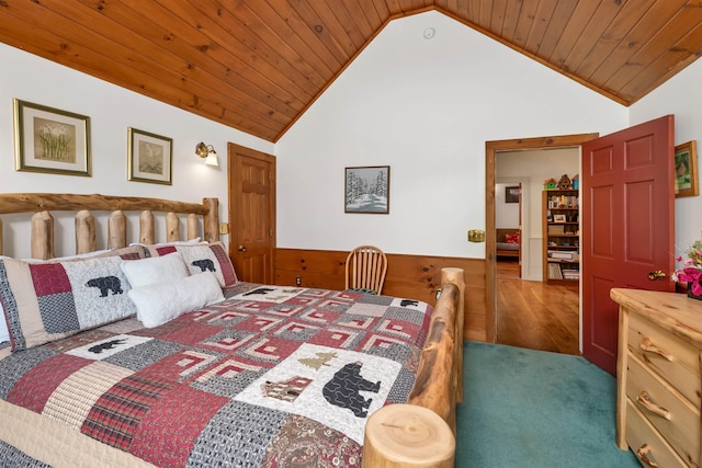 83 Towle Rd, Jackson, NH 03846 - bedroom featuring wainscoting, carpet floors, lofted ceiling, wooden ceiling, and wood walls