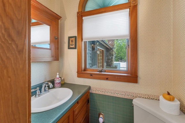 83 Towle Rd, Jackson, NH 03846 - bathroom with wallpapered walls and vanity