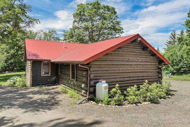 83 Towle Rd, Jackson, NH 03846 - view of side of property featuring a metal roof and log exterior