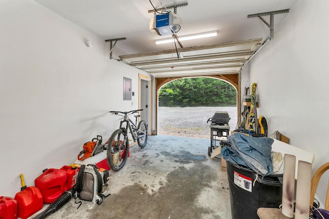 83 Towle Rd, Jackson, NH 03846 - garage with electric panel, a garage door opener, and a water view