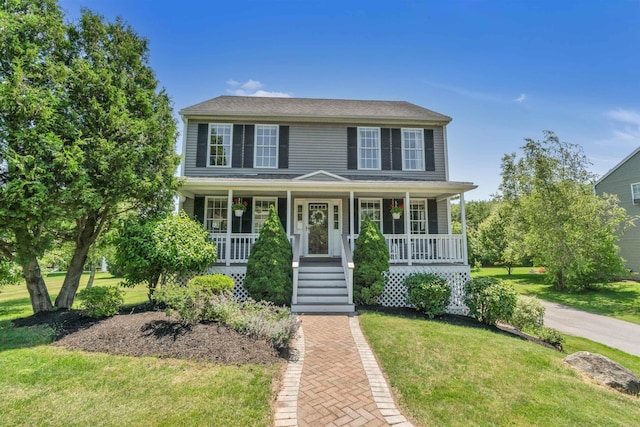 15 Winslow Dr, Somersworth, NH 03878 - colonial house with a front lawn and covered porch