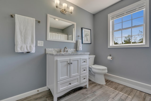 15 Winslow Dr, Somersworth, NH 03878 - bathroom with vanity and wood finished floors