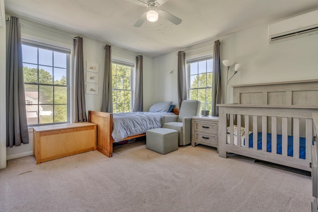 15 Winslow Dr, Somersworth, NH 03878 - bedroom featuring a wall mounted AC, carpet floors, and a ceiling fan