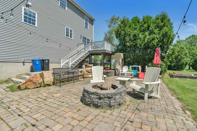 15 Winslow Dr, Somersworth, NH 03878 - view of patio / terrace featuring an outdoor fire pit, stairway, and a deck