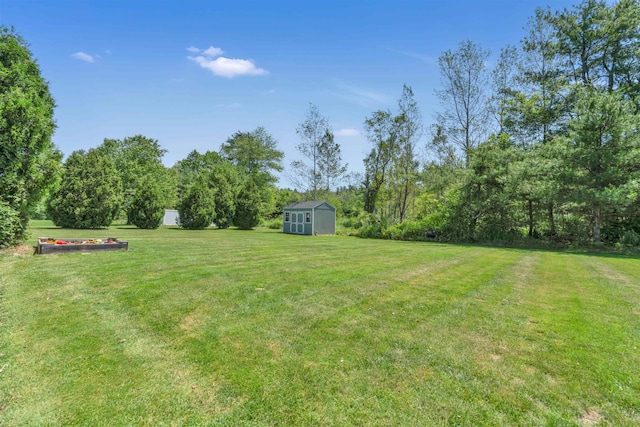 15 Winslow Dr, Somersworth, NH 03878 - view of green lawn with a storage shed