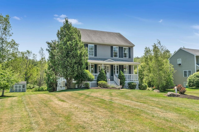 15 Winslow Dr, Somersworth, NH 03878 - colonial house with a storage shed, covered porch, and a front lawn