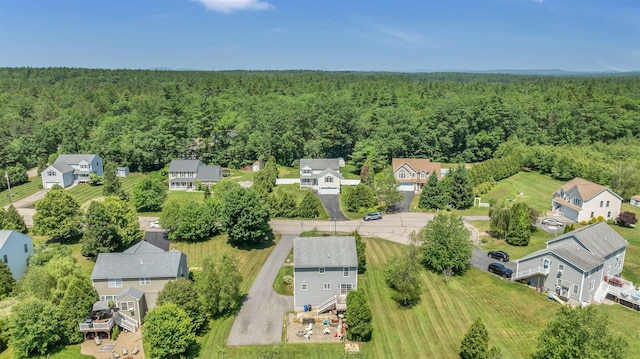 15 Winslow Dr, Somersworth, NH 03878 - aerial perspective of suburban area featuring a heavily wooded area