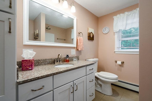 6 Lacy Ln, Nashua, NH 03062 - bathroom with a baseboard heating unit, vanity, and tile patterned flooring