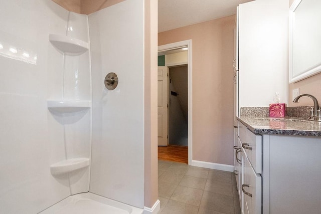 6 Lacy Ln, Nashua, NH 03062 - bathroom with vanity, tile patterned flooring, and a shower
