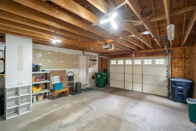 6 Lacy Ln, Nashua, NH 03062 - garage featuring a garage door opener