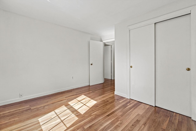9 Bryant Rd, Nashua, NH 03062 - unfurnished bedroom featuring light wood finished floors and a closet