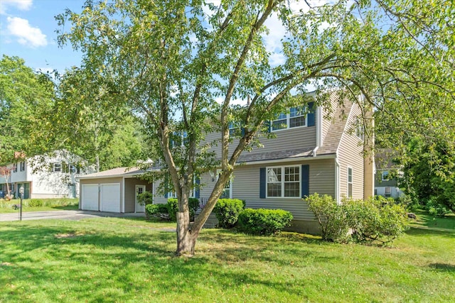 9 Bryant Rd, Nashua, NH 03062 - view of front of property with a front lawn and asphalt driveway