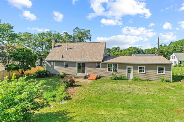 9 Bryant Rd, Nashua, NH 03062 - back of property with entry steps, a chimney, and roof with shingles