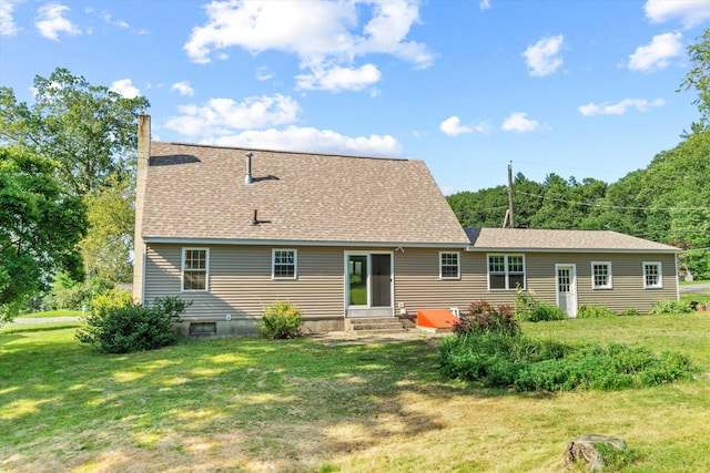 9 Bryant Rd, Nashua, NH 03062 - back of house with entry steps, a chimney, a yard, and a shingled roof