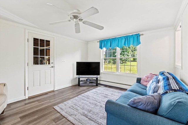 9 Bryant Rd, Nashua, NH 03062 - living area featuring a baseboard radiator, wood finished floors, ceiling fan, and crown molding