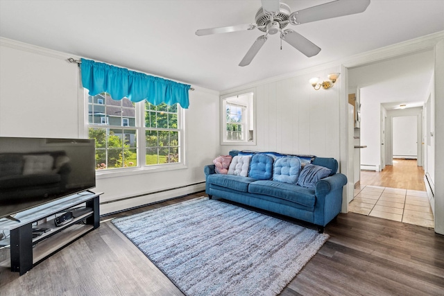 9 Bryant Rd, Nashua, NH 03062 - living area featuring baseboard heating, ornamental molding, wood finished floors, and a ceiling fan