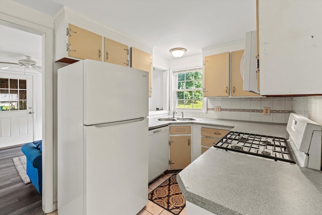 9 Bryant Rd, Nashua, NH 03062 - kitchen with white appliances, a ceiling fan, light countertops, and backsplash