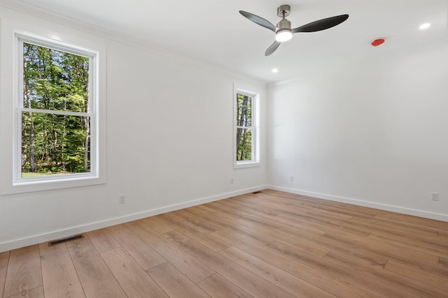 74 Scenic View Rd, Ashland, NH 03217 - unfurnished room with ornamental molding, a ceiling fan, and light wood finished floors