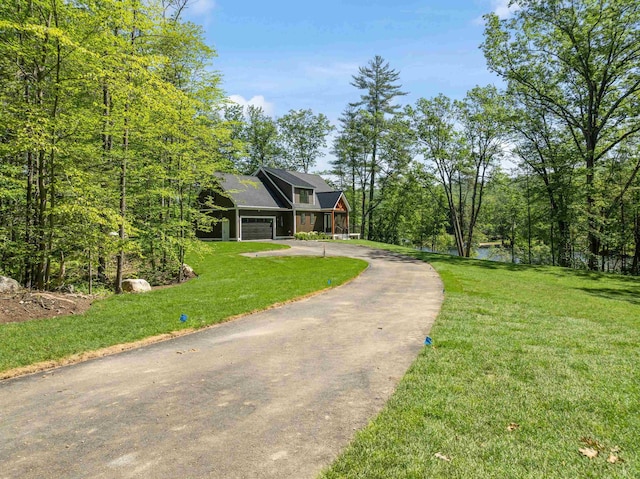 74 Scenic View Rd, Ashland, NH 03217 - view of front facade featuring driveway and a front yard