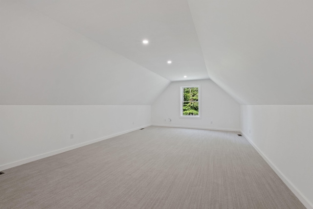 74 Scenic View Rd, Ashland, NH 03217 - additional living space with vaulted ceiling, light carpet, and recessed lighting