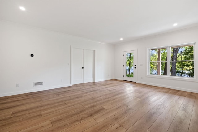 74 Scenic View Rd, Ashland, NH 03217 - empty room featuring light wood finished floors, crown molding, and recessed lighting