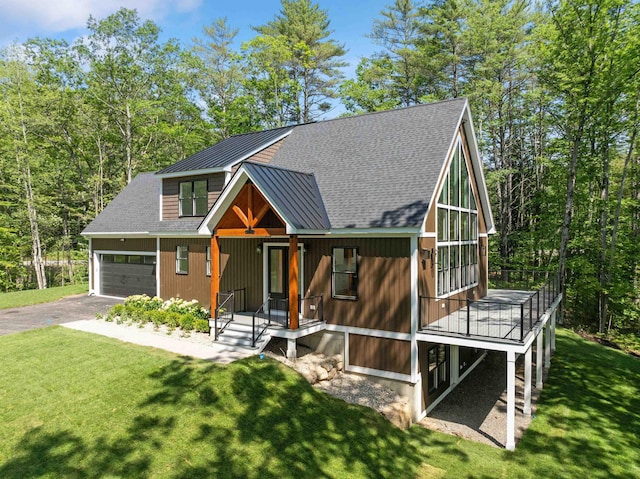 74 Scenic View Rd, Ashland, NH 03217 - view of front of house with a garage, driveway, a front lawn, a shingled roof, and a porch